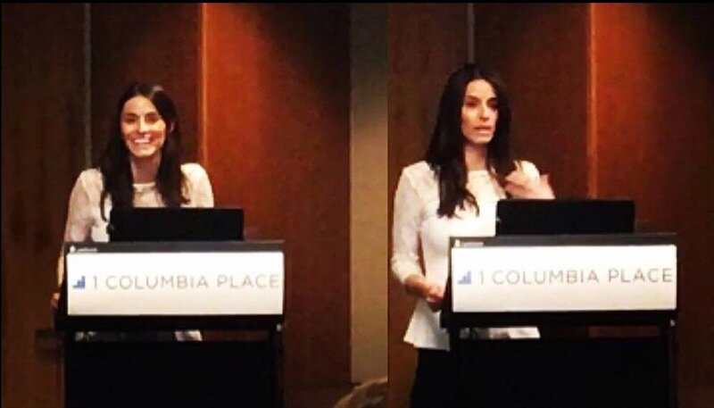 Natalie speaking at event