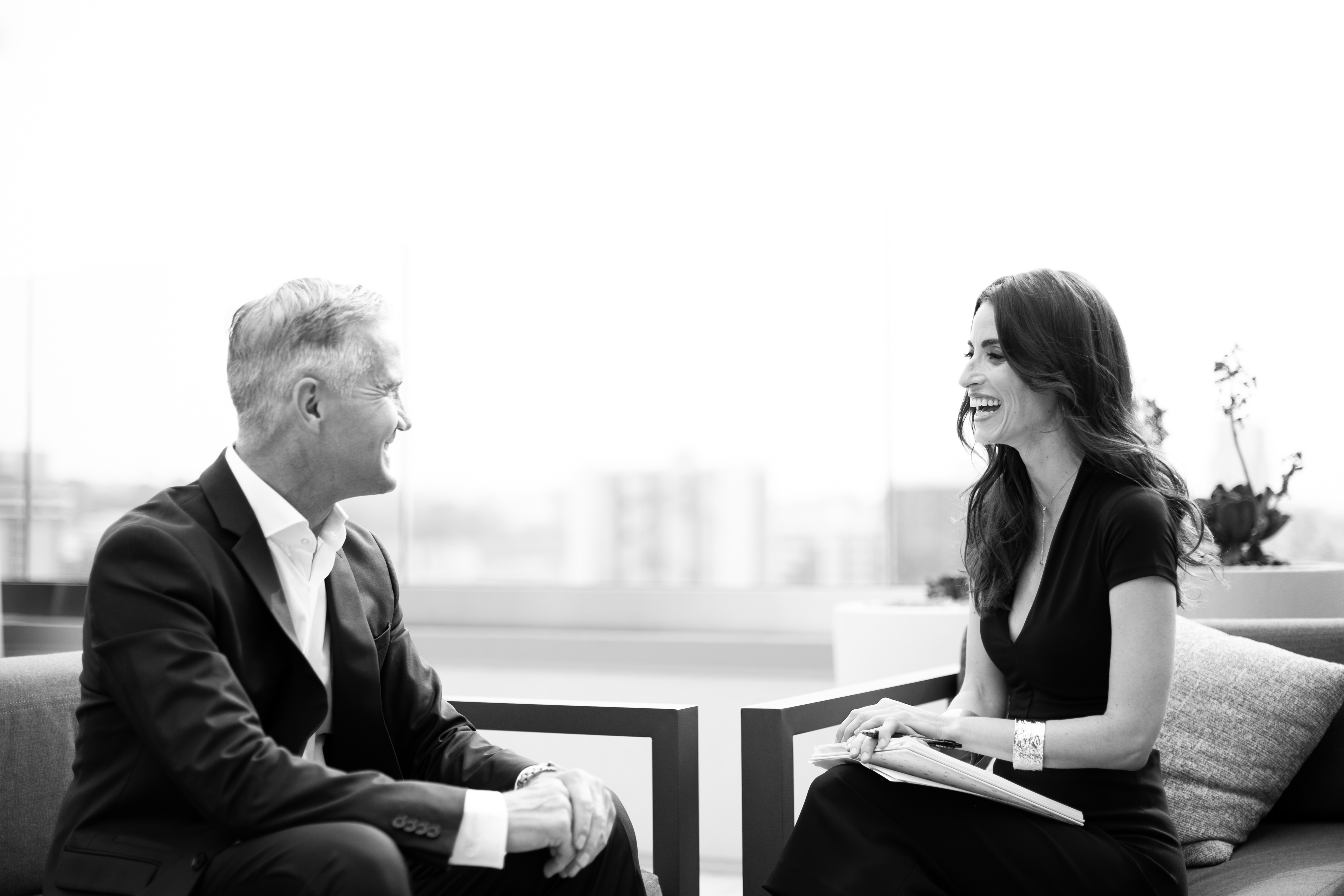 Natalie Susi coaching a client on a rooftop